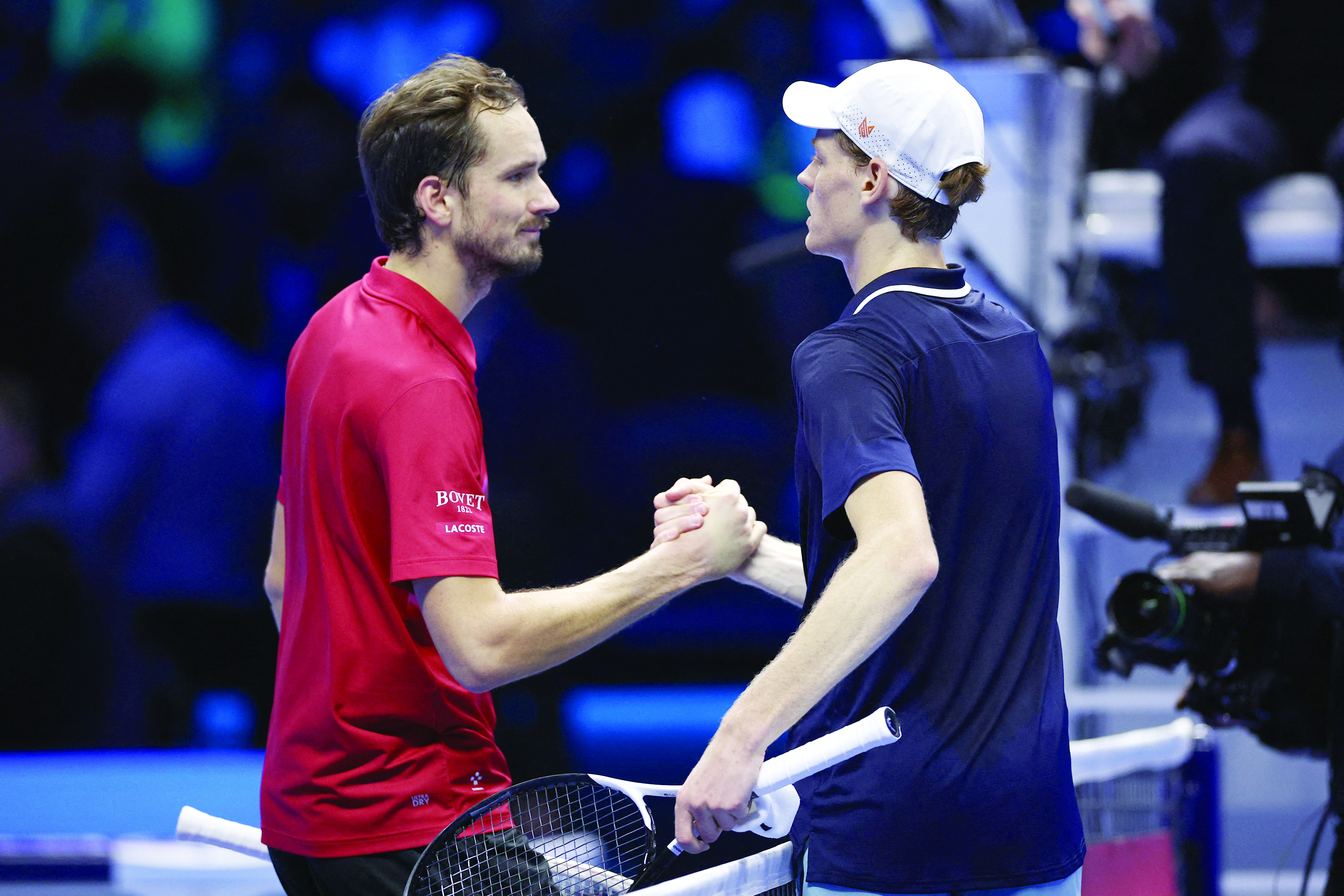 italy s jannik sinner shakes hands with russia s daniil medvedev after winning his singles group stage match photo reuters