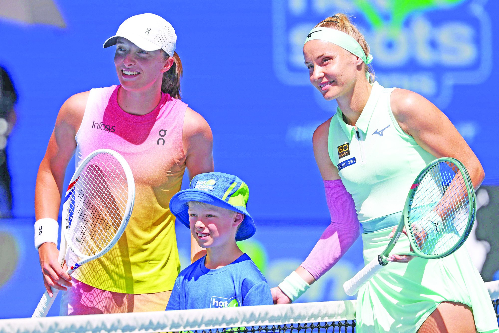 slovakia s rebecca sramkova r and poland s iga swiatek pose for picture ahead of their women s singles match at the australian open in melbourne photo afp