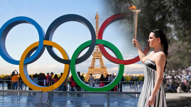 olympic torch relay completes first day in france olympic torch relay completes first day in france