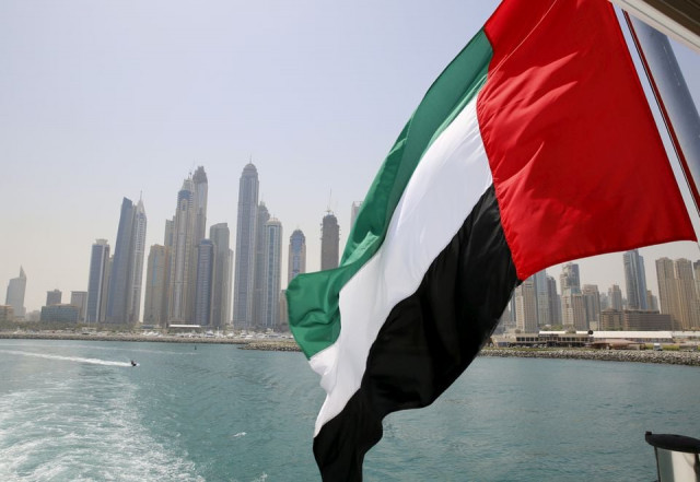 uae flag flies over a boat at dubai marina dubai united arab emirates may 22 2015 photo reuters uae flag flies over a boat at dubai marina dubai united arab emirates may 22 2015 photo reuters