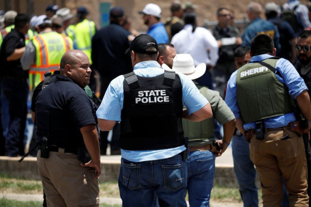 law enforcement personnel guard the scene of a suspected shooting near robb elementary school in uvalde texas u s may 24 2022 reuters law enforcement personnel guard the scene of a suspected shooting near robb elementary school in uvalde texas u s may 24 2022 reuters