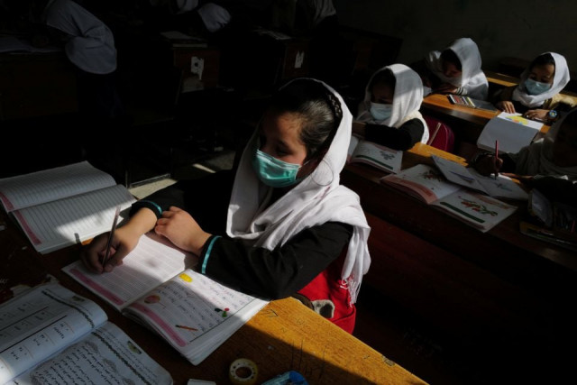 a 4th grade primary school student attends a class in kabul afghanistan october 25 2021 reuters