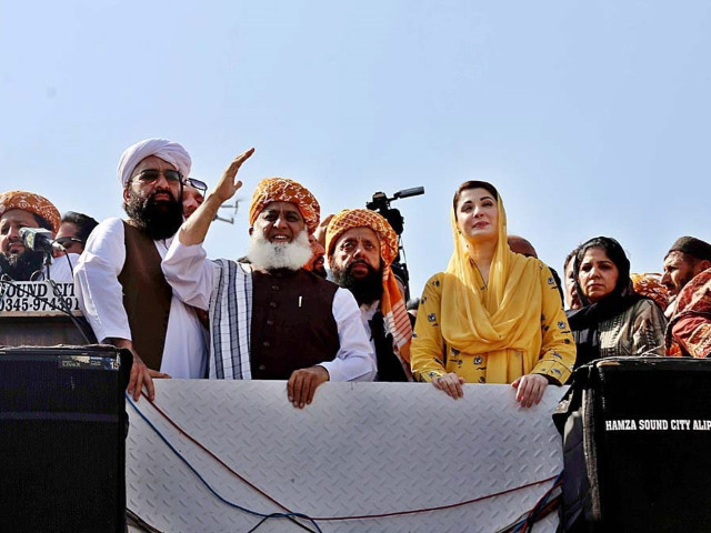 pdm leaders maulana fazlur rehman and maryam nawaz attend the protest outside the supreme court photo agencies