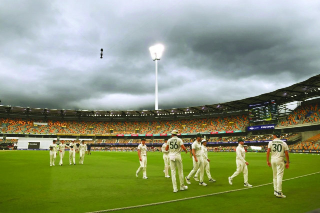 ind finish on high note in rain hit gabba test