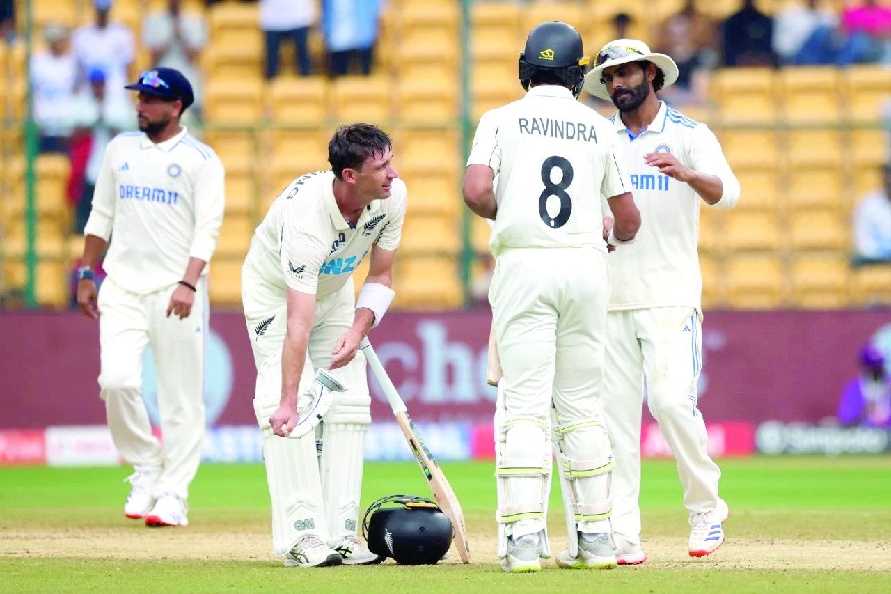 ravindra jadeja congratulates rachin ravindra as will young looks on after new zealand s win photo bcci