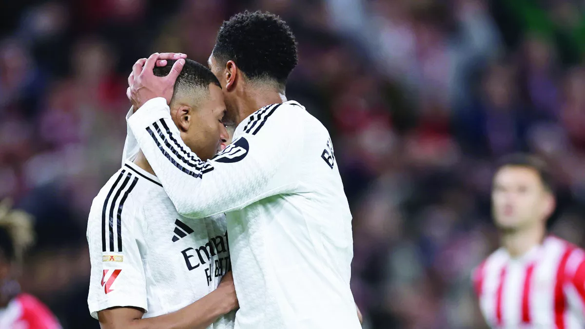 real madrid s french forward kylian mbappe l is comforted by jude bellingham after missing his penalty photo afp real madrid s french forward kylian mbappe l is comforted by jude bellingham after missing his penalty photo afp