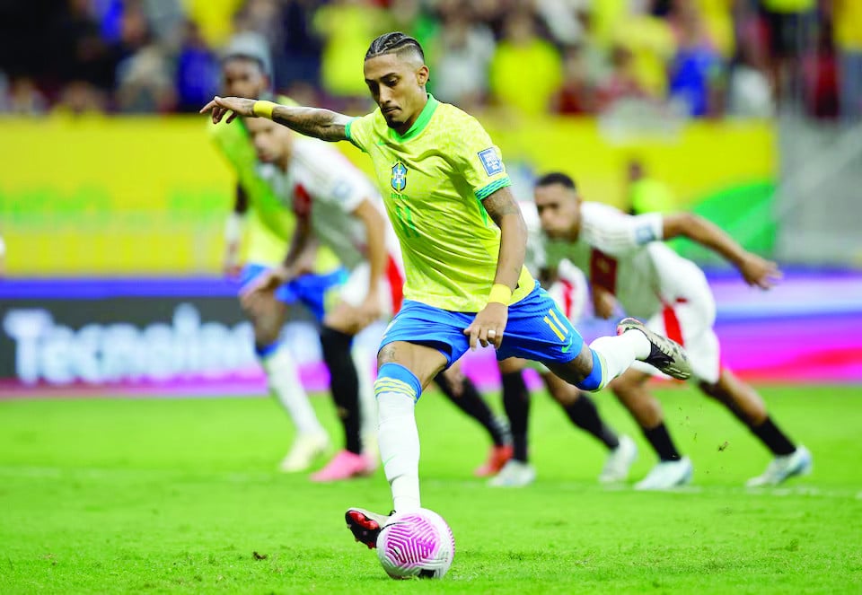 raphinha double helps brazil down peru