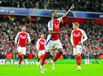 saka brace sinks monaco as arsenal eye ucl last 16