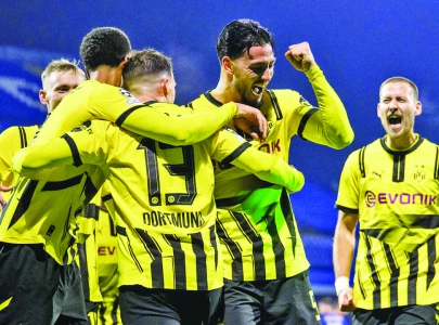 dortmund beat zagreb to enter ucl top four