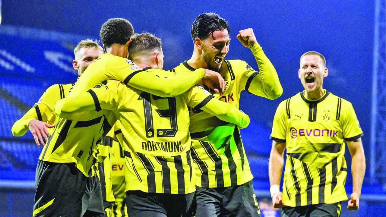 dortmund forward jamie gittens l scored a stunner in his side s 3 0 win on november 27 2024 photo afp