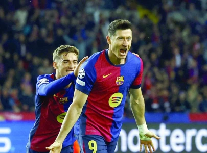 lewandowski stars as barca beat brest