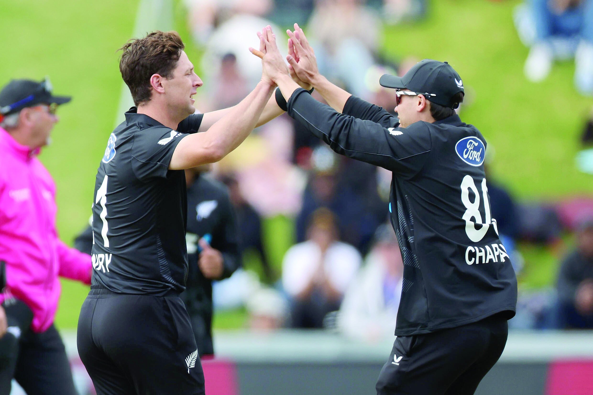 new zealand s matt henry left celebrates the wicket of sri lanka s pathum nissanka with teammate mark chapman photo afp