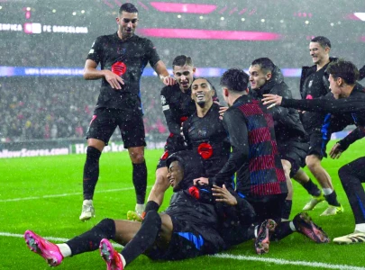 barca triumph over wild benfica in ucl