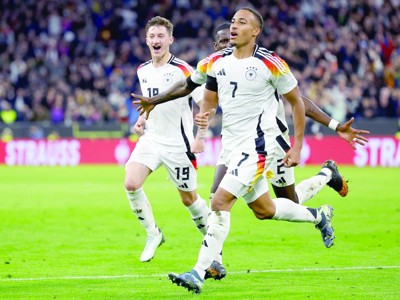 germany midfielder jamie leweling celebrates after his second half goal photo afp