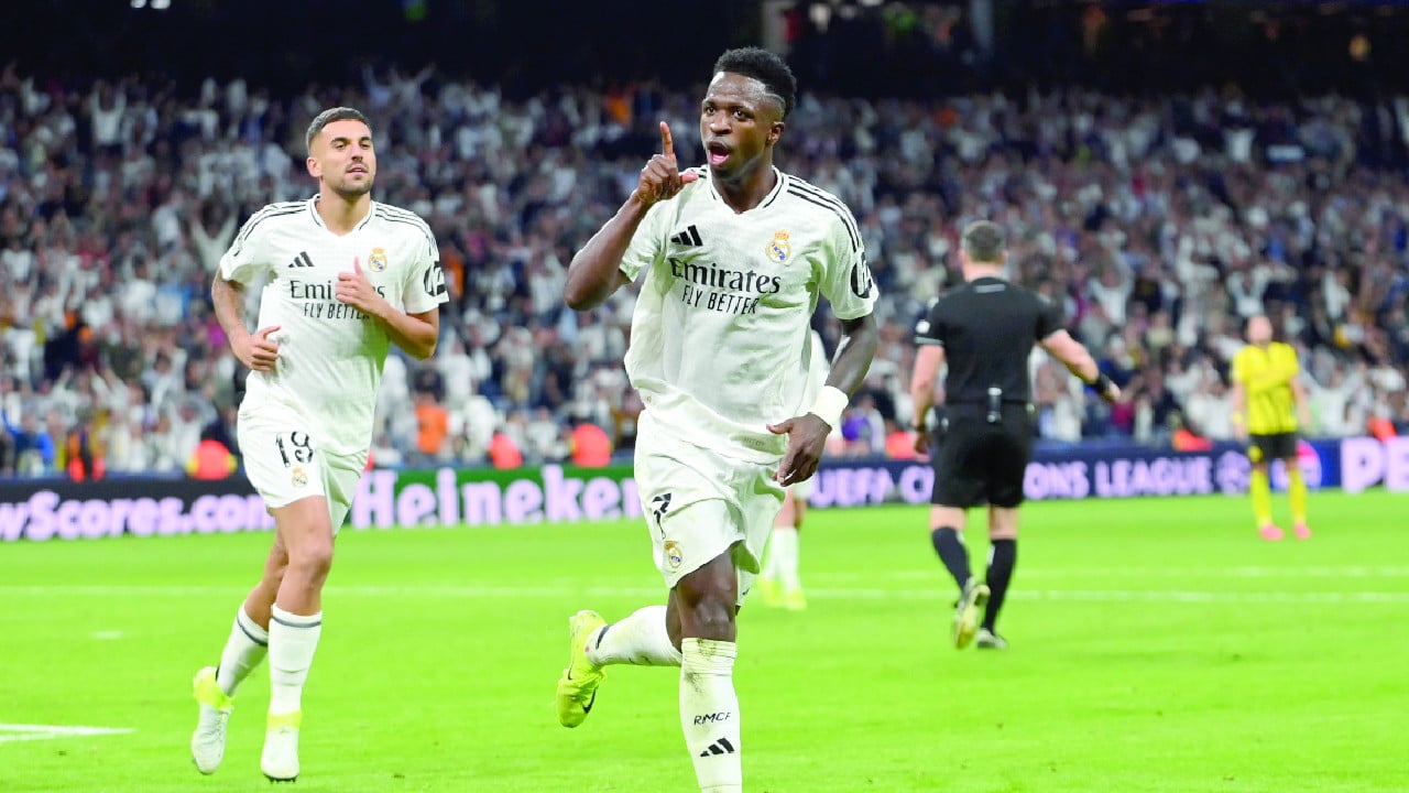 vinicius jr celebrates his hat trick against borussia dortmund photo afp