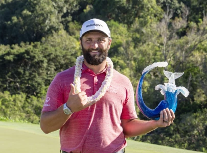 rahm powers to kapalua victory