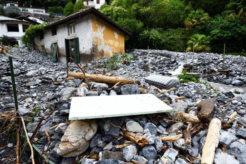 a house hit by a landslide is seen after heavy rain caused flooding in towns surrounding lake como in northern italy in laglio italy july 27 2021 photo reuters