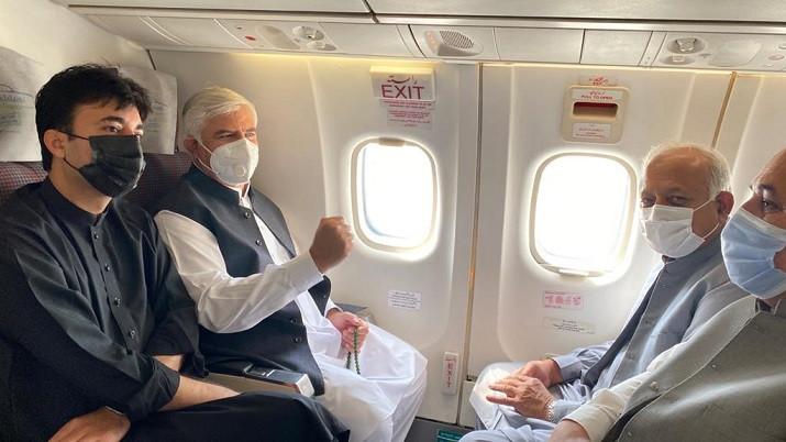 khyber pakhtunkhwa chief minister mahmood khan aviation minister ghulam sarwar khan and federal minister murad saeed onboard pia s first flight to swat in years photo express