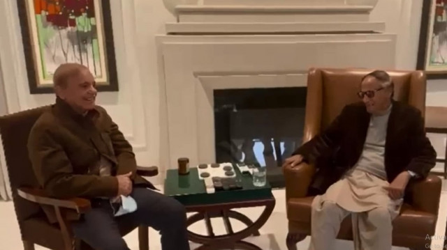 prime minister shehbaz sharif speaks with pml q president chaudhry shujaat hussain during a meeting in lahore photo screengrab