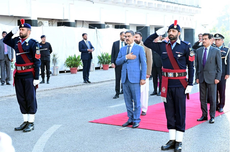 Caretaker PM Anwaarul Haq Kakar being presented a guard of honour at the Ministry of Interior, Islamabad, December 11, 2023. PHOTO: PID