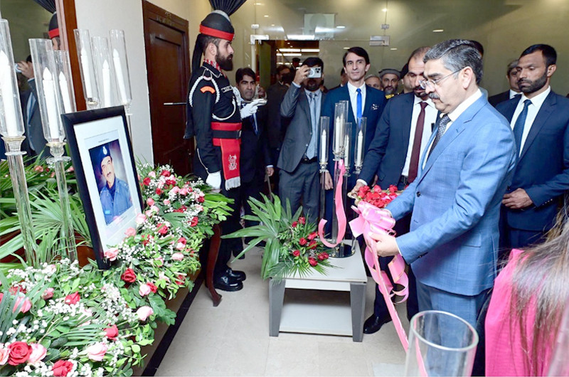 Caretaker Prime Minister Anwaarul Haq Kakar inaugurating the Martyrs' Wall in the Ministry of Interior on 11 December, 2023. PHOTO: PID