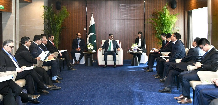 Prime Minister Kakar meets a delegation of Chinese businessmen during his visit to China for the Third Belt and Road Forum. PHOTO: APP