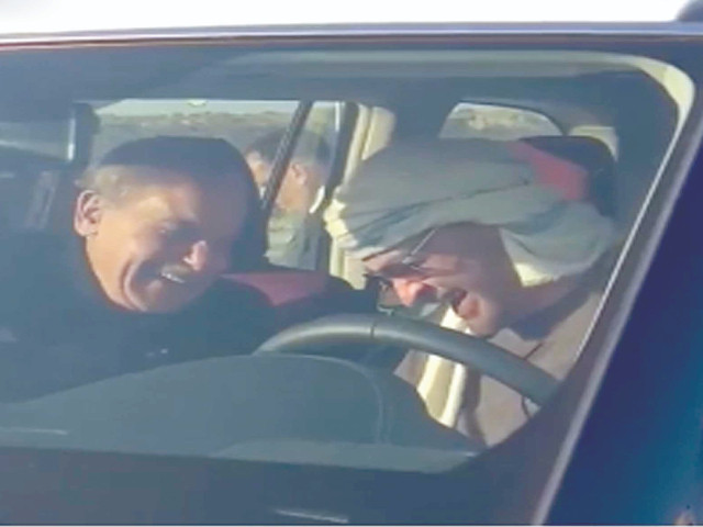 prime minister shehbaz sharif and uae president sheikh mohamed bin zayed al nahyan share a light moment in a car as they leave the airport in rahim yar khan photo nni