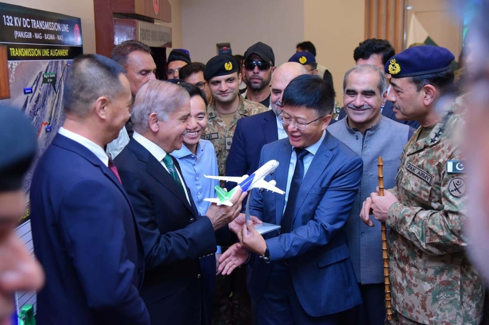 prime minister shehbaz sharif is presented a model of an aircraft by a chinese official at the new gwadar international airport photo inp