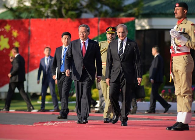 pm shehbaz sharif and chinese premier li qiang at pm house in islamabad on monday photo pid