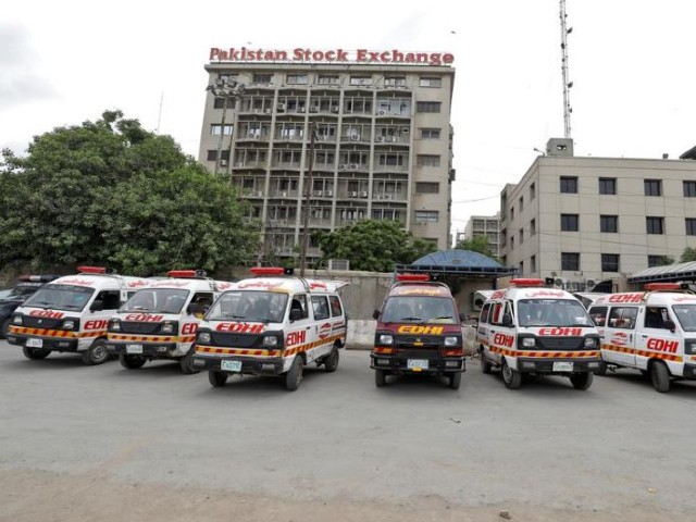 ambulances are seen parked outside pakistan stock exchange building after the terrorist attack in karachi photo reuters