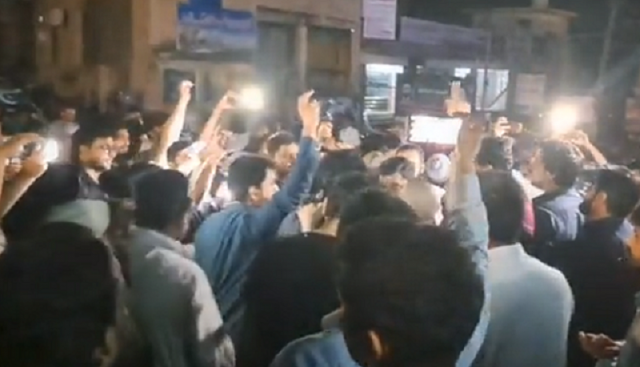 pti workers and supporters outside former pm imran khan s banigala residence screengrab pti workers and supporters outside former pm imran khan s banigala residence screengrab