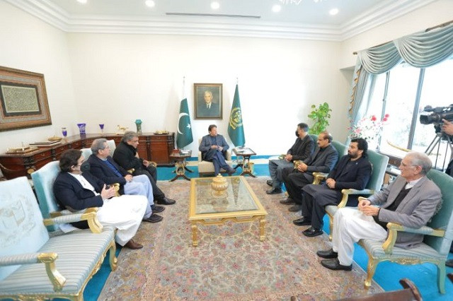 in this undated photo prime minister imran khan is seen chairing a meeting of the top pakistan tehreek e insaf pti leaders in islamabad photo app