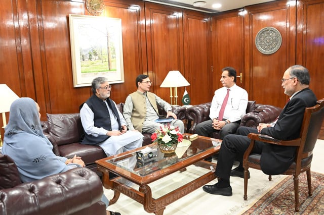 members of the special parliamentary committee along with na speaker sardar ayaz sadiq met with barrister gohar in an effort to secure pti s participation photo express