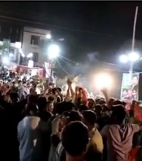 pti supporters celebrate victory in faisalabad screen shot