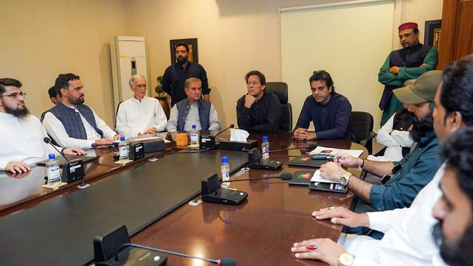 pti chairman imran khan with party leaders during a meeting photo facebook ptiofficial