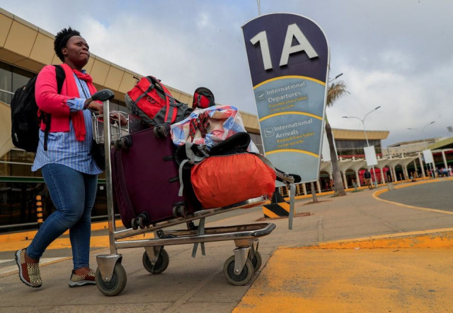 a woman pushes her luggage after her flight was cancelled during a strike by kenya airways pilots organised by kenya airline pilots association kalpa at the jomo kenyatta international airport in nairobi kenya reuters thomas mukoya a woman pushes her luggage after her flight was cancelled during a strike by kenya airways pilots organised by kenya airline pilots association kalpa at the jomo kenyatta international airport in nairobi kenya reuters thomas mukoya
