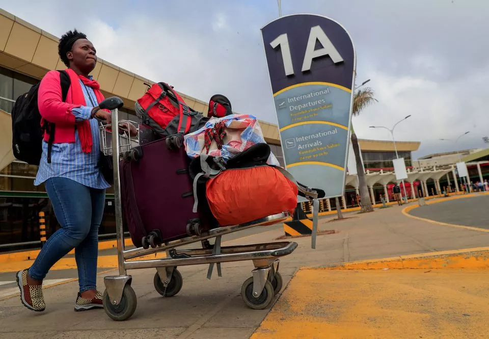 a woman pushes her luggage after her flight was cancelled during a strike by kenya airways pilots organised by kenya airline pilots association kalpa at the jomo kenyatta international airport in nairobi kenya reuters thomas mukoya a woman pushes her luggage after her flight was cancelled during a strike by kenya airways pilots organised by kenya airline pilots association kalpa at the jomo kenyatta international airport in nairobi kenya reuters thomas mukoya