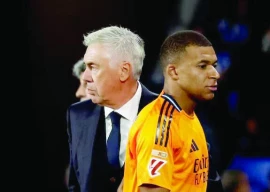 real madrid s kylian mbappe with coach carlo ancelotti after being substituted off during laliga match against real sociedad on september 14 2024 photo reuters