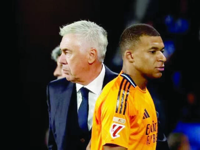 real madrid s kylian mbappe with coach carlo ancelotti after being substituted off during laliga match against real sociedad on september 14 2024 photo reuters real madrid s kylian mbappe with coach carlo ancelotti after being substituted off during laliga match against real sociedad on september 14 2024 photo reuters