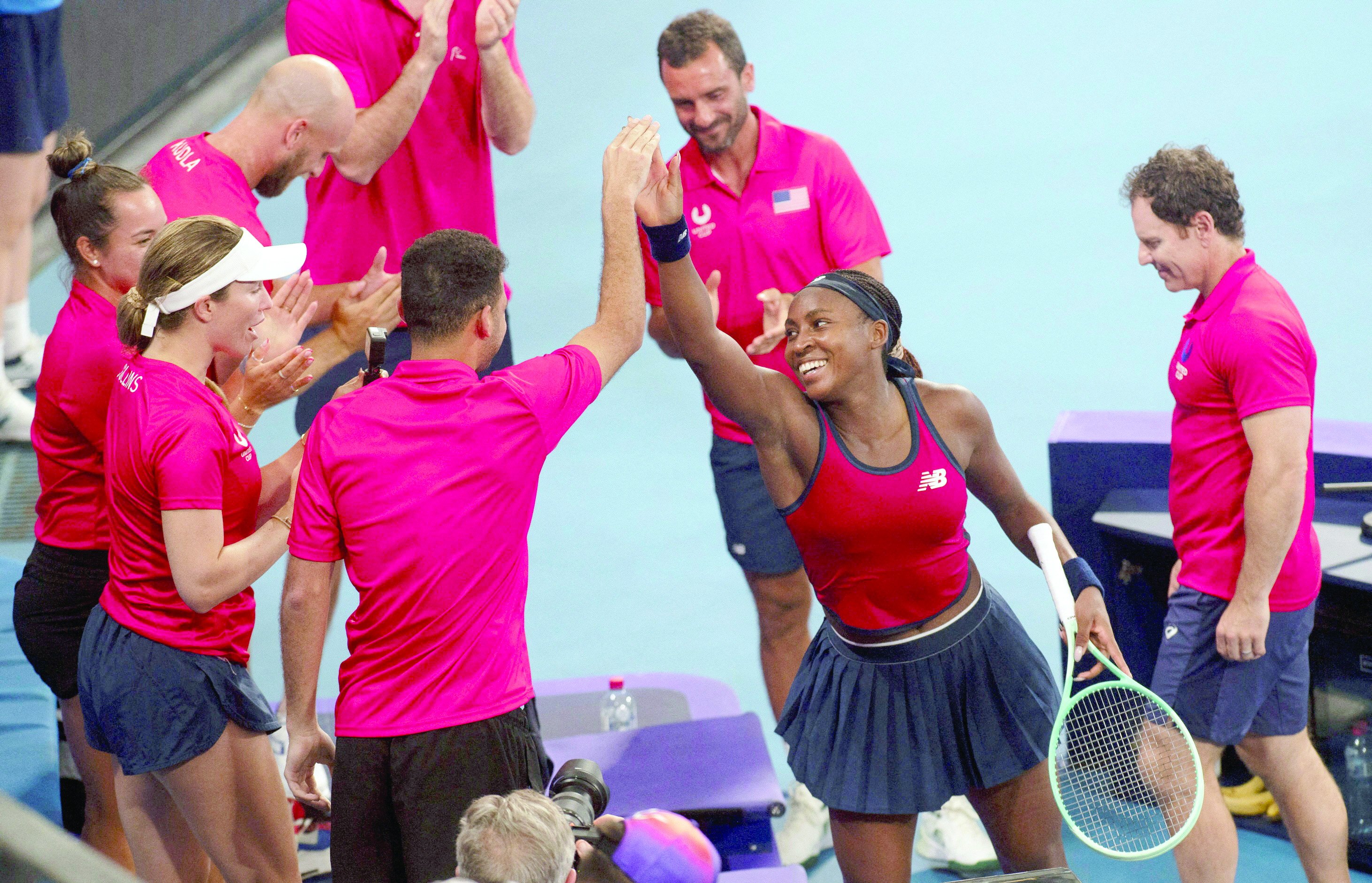 america s coco gauff celebrates with teammates after winning her united cup semifinal against czech republic s karolina muchova at the rosewall arena sydney photo reuters