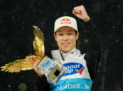 kobayashi wins third four hills ski jump title