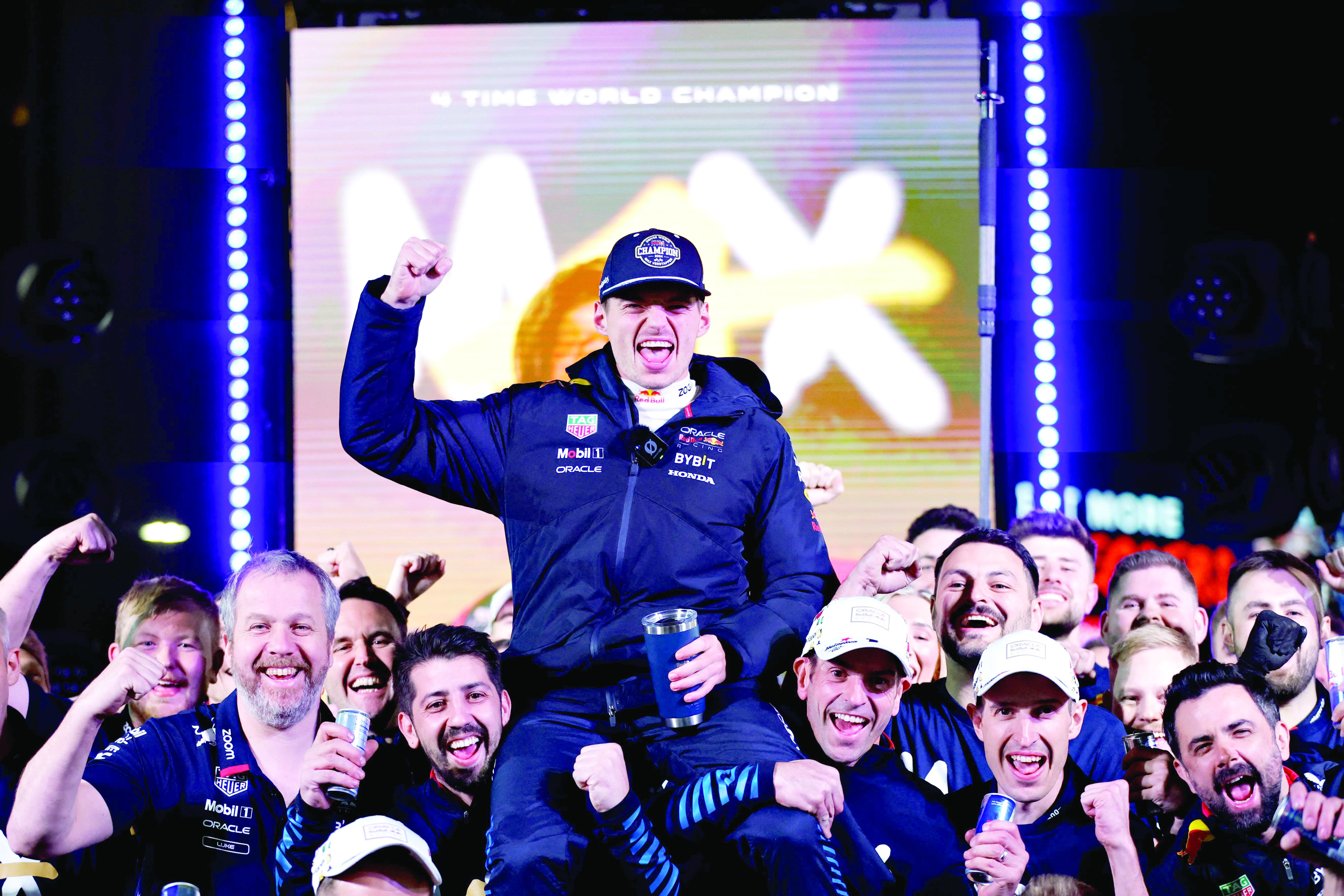 2024 f1 world drivers champion max verstappen and oracle red bull racing celebrate in the paddock after the f1 grand prix at las vegas strip circuit photo afp