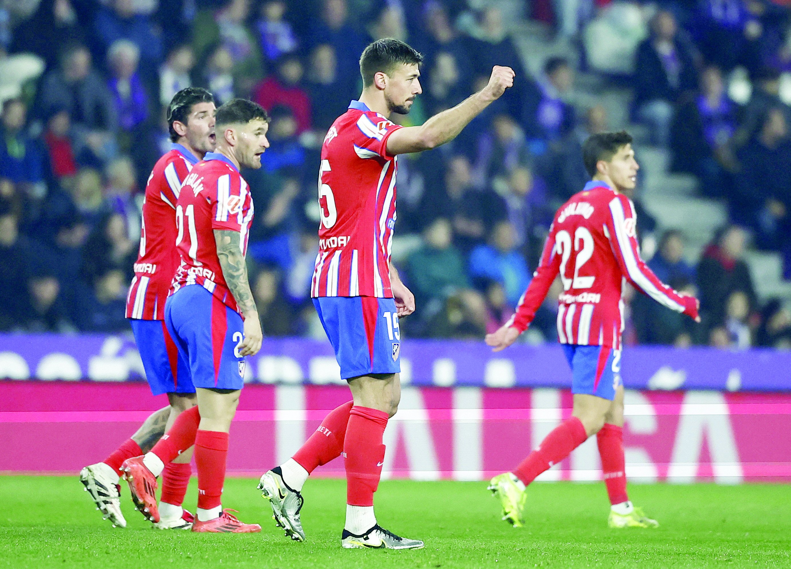 atletico madrid s clement lenglet celebrates with team mates after scoring their first goal during laliga match against real valladolid at estadio jose zorrilla valladolid photo reuters