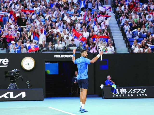 serbia s novak djokovic reacts after a point against czech republic s tomas machac during their match on day six of the australian open tennis tournament in melbourne on january 17 photo afp serbia s novak djokovic reacts after a point against czech republic s tomas machac during their match on day six of the australian open tennis tournament in melbourne on january 17 photo afp