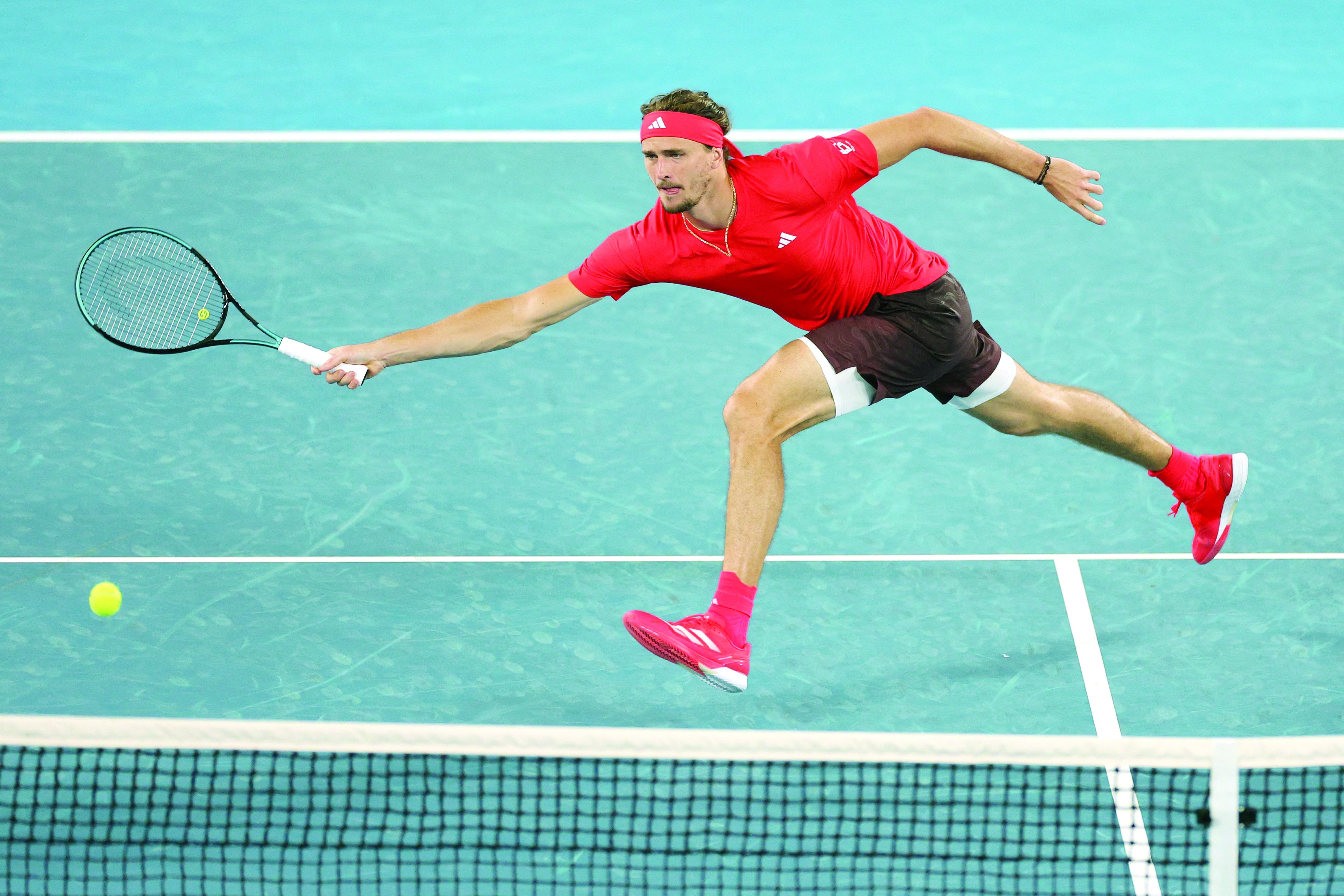 alexander zverev hits a shot against france s lucas pouille during their match on day one of the australian open tennis tournament in melbourne on january 12 photo reuters