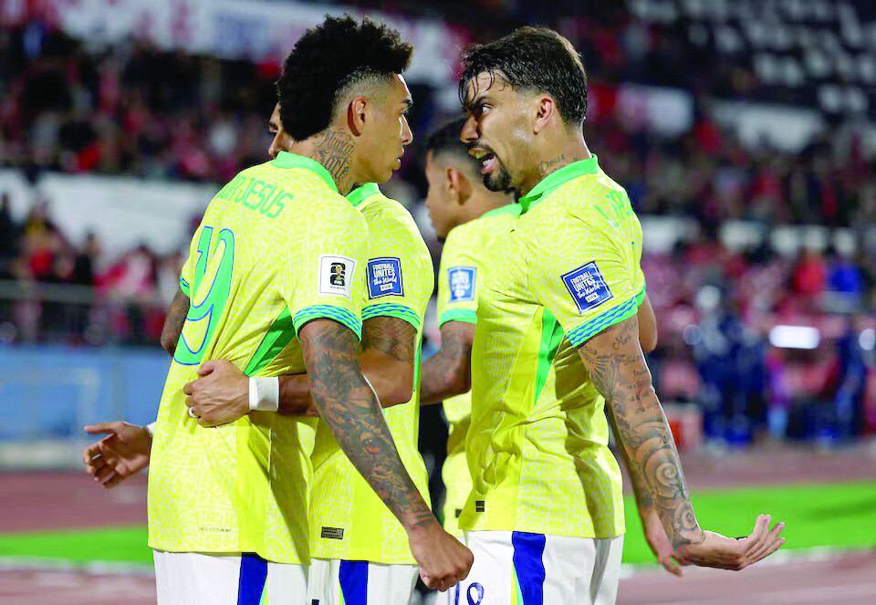 brazil s igor jesus celebrates scoring their first goal with lucas paqueta during the world cup south american qualifiers against chile reuters