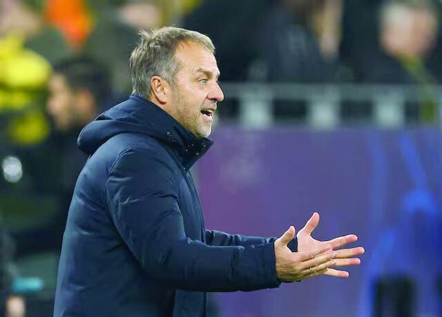 fc barcelona coach hansi flick reacts during the champions league match against borussia dortmund at signal iduna park on december 11 photo reuters