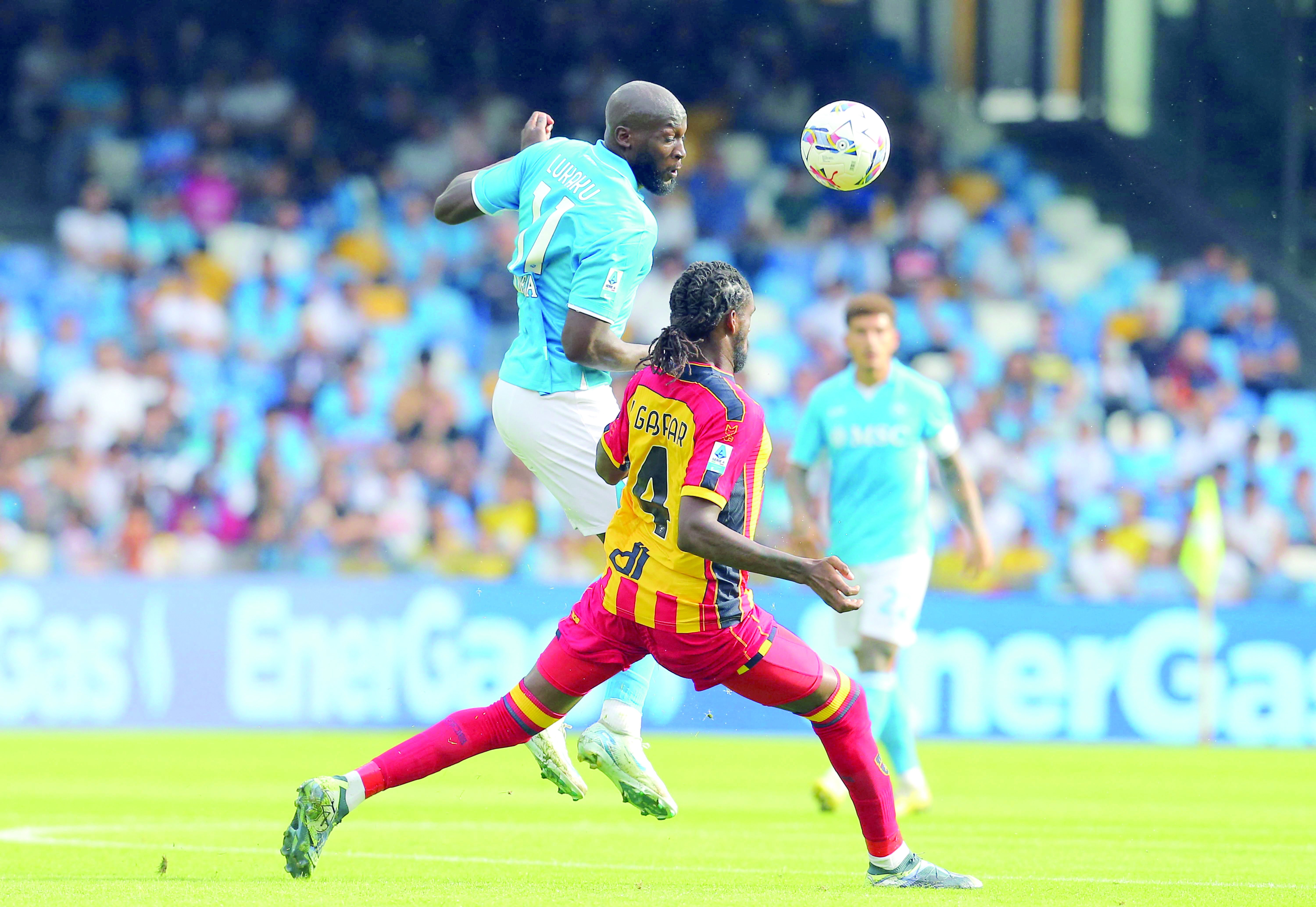 napoli s romelu lukaku fights for the ball with lecce s kialonda gaspar during the italian serie a football match at the diego armando maradona stadium in naples photo afp