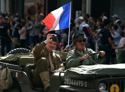 macron leads tribute as paris marks 80 years of freedom from nazi occupation macron leads tribute as paris marks 80 years of freedom from nazi occupation
