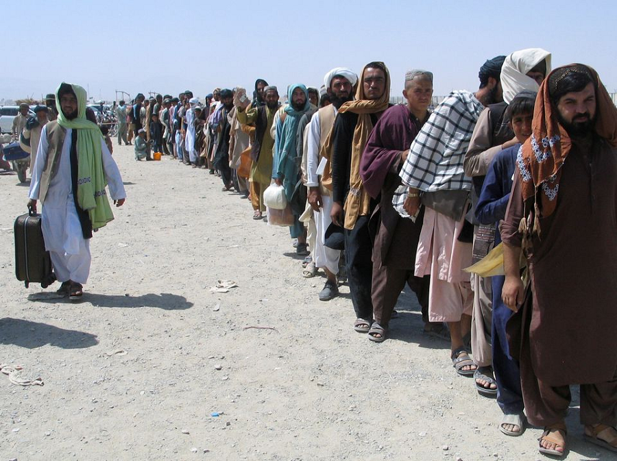 people wait to cross into afghanistan at the friendship gate crossing point at the pakistan afghanistan border town of chaman pakistan august 19 2021 photo reuters